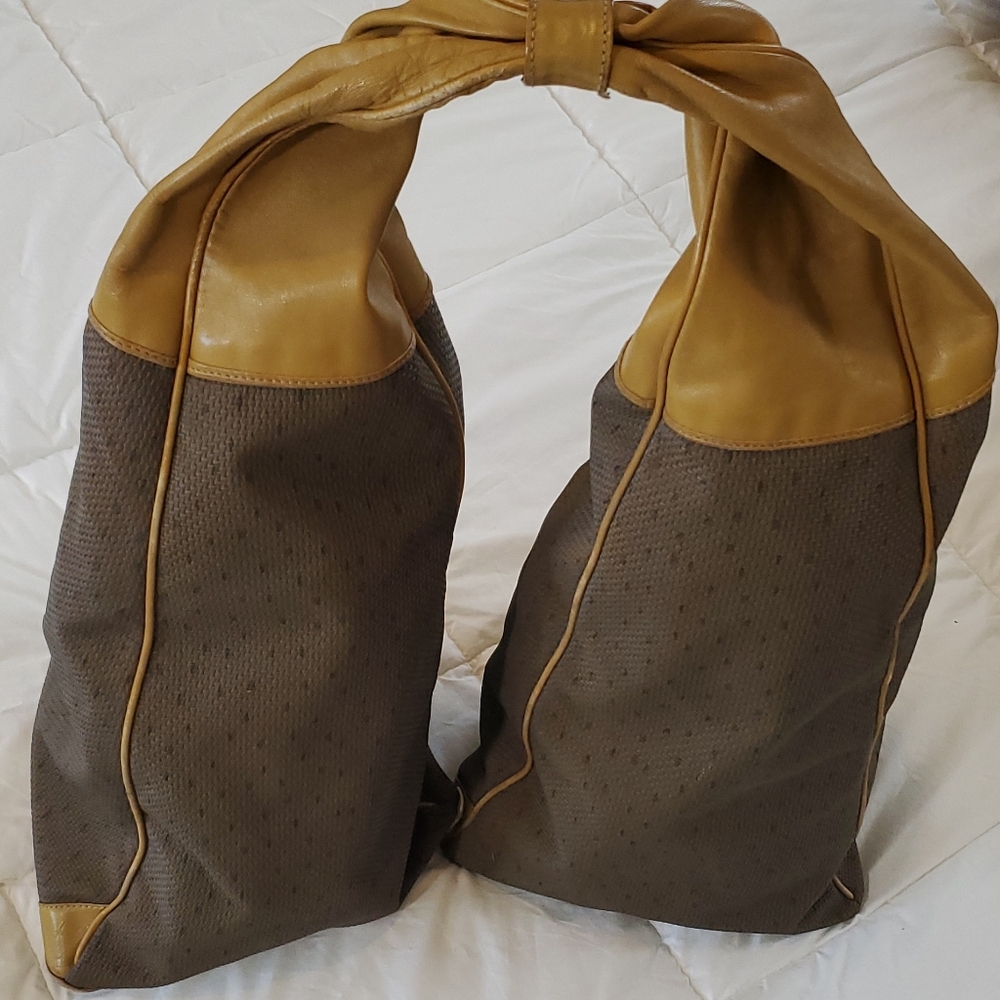 Yves Saint Laurent Top Knot Double Sided Shoulder Bag. 24" X 10" X1 0" (Triangle